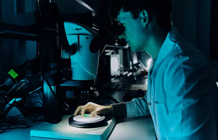 Researcher working on smart wearable technology.